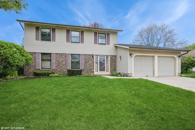 714 New Mexico Trl, Elk Grove Village, IL 60007 - view of front of home with an attached garage, concrete driveway, a front yard, and brick siding