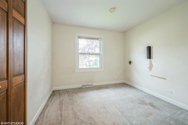 714 New Mexico Trl, Elk Grove Village, IL 60007 - unfurnished room with light colored carpet, baseboards, and a smoke detector