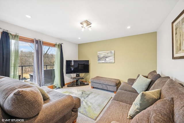living area featuring recessed lighting, baseboards, and carpet floors