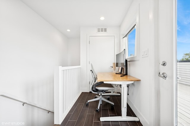 office space with healthy amount of natural light, wood finish floors, recessed lighting, and baseboards