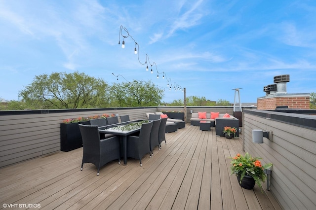 wooden deck with an outdoor hangout area
