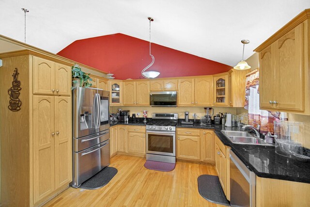 513 Wallace St, Chicago Heights, IL 60411 - kitchen with light wood-style floors, hanging light fixtures, a sink, glass insert cabinets, and stainless steel appliances