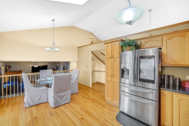 513 Wallace St, Chicago Heights, IL 60411 - kitchen featuring light brown cabinetry, stainless steel fridge, light wood finished floors, ceiling fan with notable chandelier, and lofted ceiling