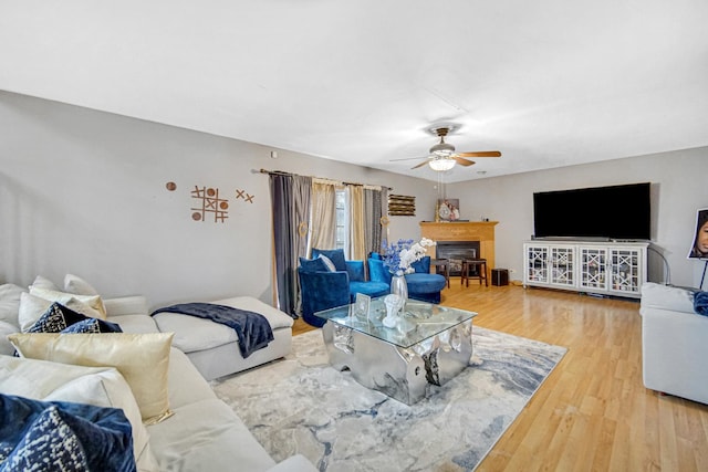 513 Wallace St, Chicago Heights, IL 60411 - living area featuring a ceiling fan, wood finished floors, and a fireplace