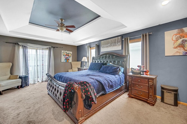 513 Wallace St, Chicago Heights, IL 60411 - bedroom with carpet flooring, a ceiling fan, a tray ceiling, and multiple windows