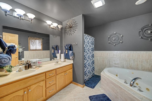 513 Wallace St, Chicago Heights, IL 60411 - bathroom featuring a tub with jets, a sink, tile patterned flooring, and double vanity