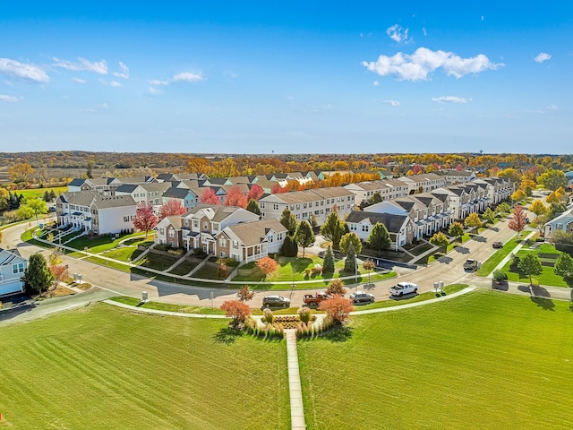 birds eye view of property with a residential view