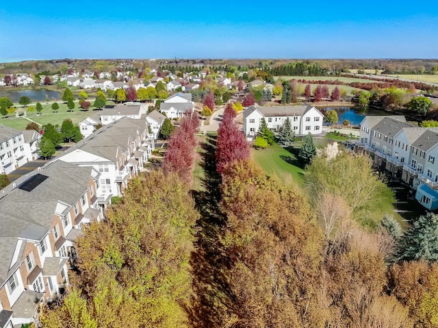 aerial view with a residential view and a water view