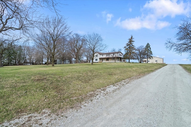 view of road with driveway