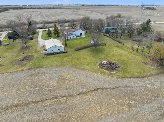 birds eye view of property featuring a rural view