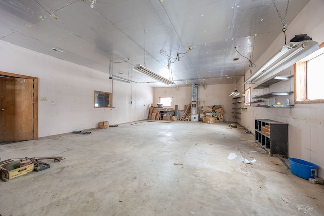 garage featuring a workshop area