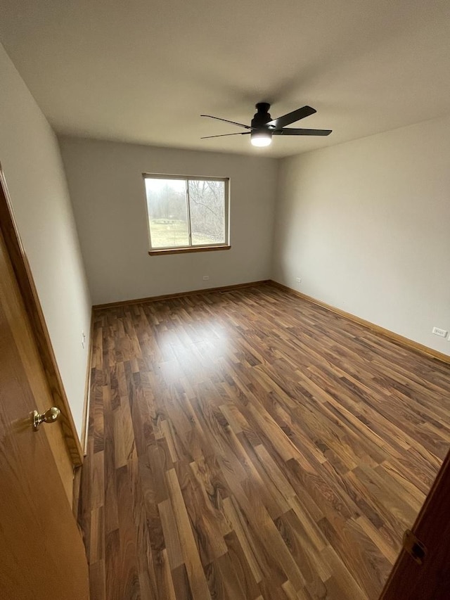 425 Tamarack St, Park Forest, IL 60466 - empty room featuring dark wood-style flooring and ceiling fan
