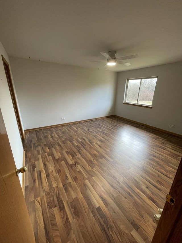425 Tamarack St, Park Forest, IL 60466 - spare room featuring dark wood-type flooring and ceiling fan