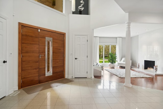 12 Forest Ln, South Barrington, IL 60010 - foyer with baseboards, decorative columns, a towering ceiling, and visible vents