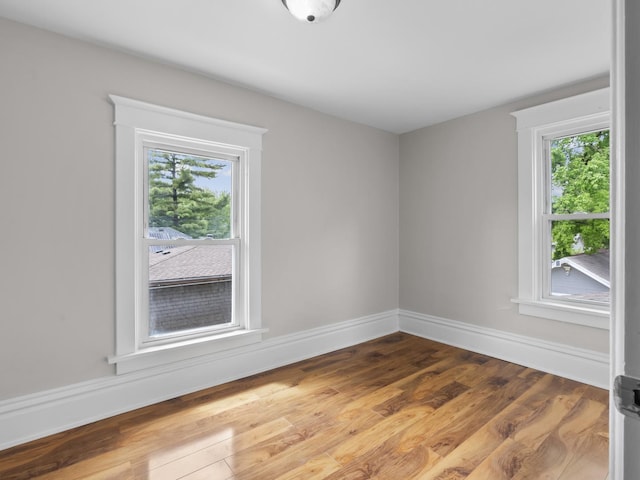 908 Superior St, Aurora, IL 60505 - spare room with wood finished floors and baseboards