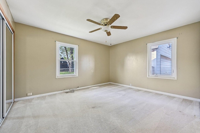 27 Arlington Dr, Romeoville, IL 60446 - empty room featuring ceiling fan, carpet flooring, and baseboards