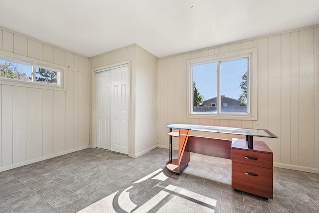 27 Arlington Dr, Romeoville, IL 60446 - unfurnished office featuring healthy amount of natural light, baseboards, and wooden walls