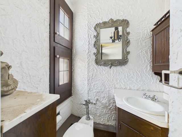 5555 S Everett Ave Unit B3-4, Chicago, IL 60637 - bathroom with toilet, vanity, and a textured wall
