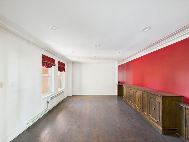 5555 S Everett Ave Unit B3-4, Chicago, IL 60637 - unfurnished room featuring crown molding, recessed lighting, dark wood-style flooring, and radiator heating unit