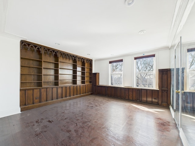 5555 S Everett Ave Unit B3-4, Chicago, IL 60637 - spare room featuring a wealth of natural light, ornamental molding, and wood finished floors