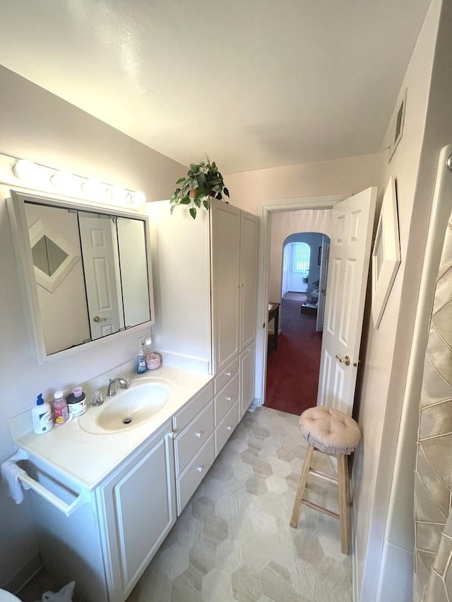 bathroom with visible vents and vanity
