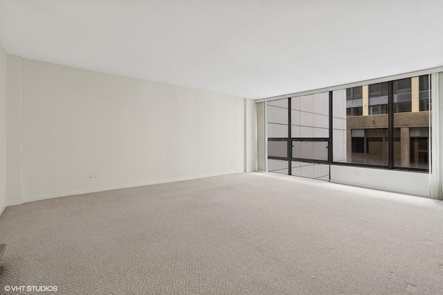 230 E Ontario St Unit 1205, Chicago, IL 60611 - carpeted empty room with baseboards