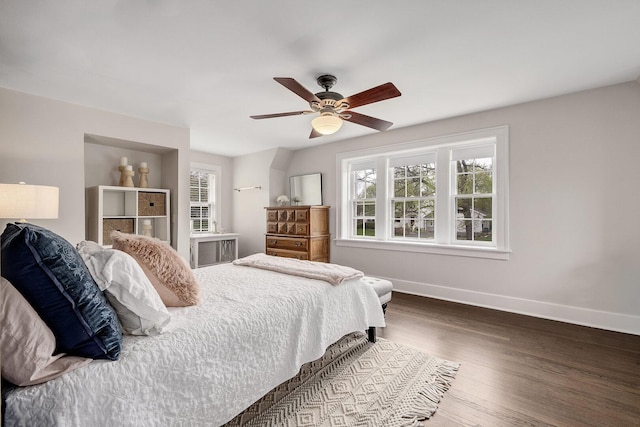 5619 Dunham Rd, Downers Grove, IL 60516 - bedroom featuring baseboards, multiple windows, wood finished floors, and a ceiling fan