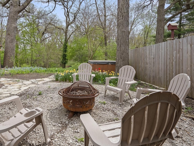 5619 Dunham Rd, Downers Grove, IL 60516 - view of patio with a hot tub and a fire pit