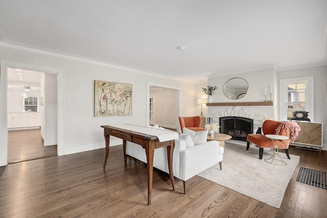 5619 Dunham Rd, Downers Grove, IL 60516 - living room with ornamental molding, healthy amount of natural light, a premium fireplace, and wood finished floors