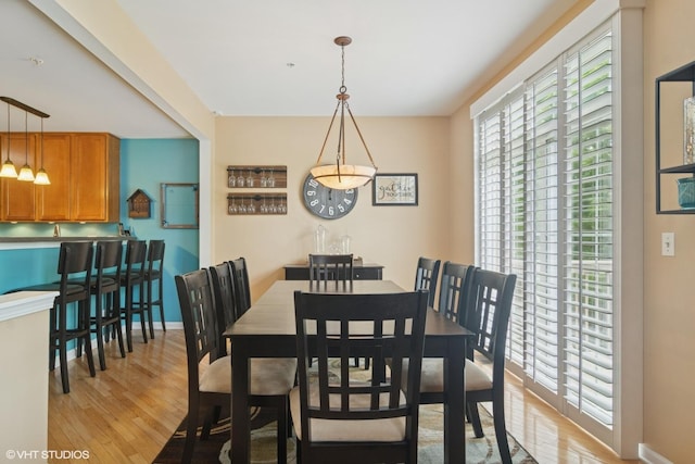 5515 Mcdonough Rd Unit 5515, Hoffman Estates, IL 60192 - dining area featuring light wood finished floors and baseboards