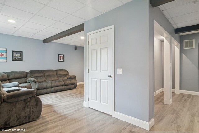5515 Mcdonough Rd Unit 5515, Hoffman Estates, IL 60192 - living room featuring light wood-style flooring, baseboards, a paneled ceiling, and recessed lighting