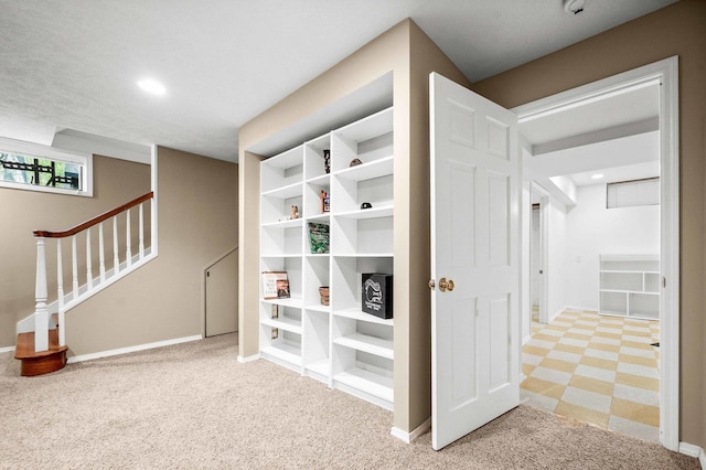 interior space featuring carpet floors, recessed lighting, and baseboards