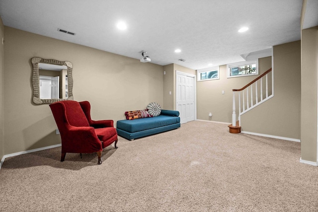 sitting room with carpet floors, baseboards, recessed lighting, and visible vents