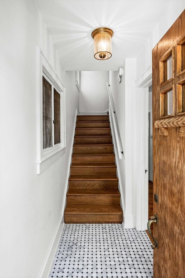 staircase with baseboards