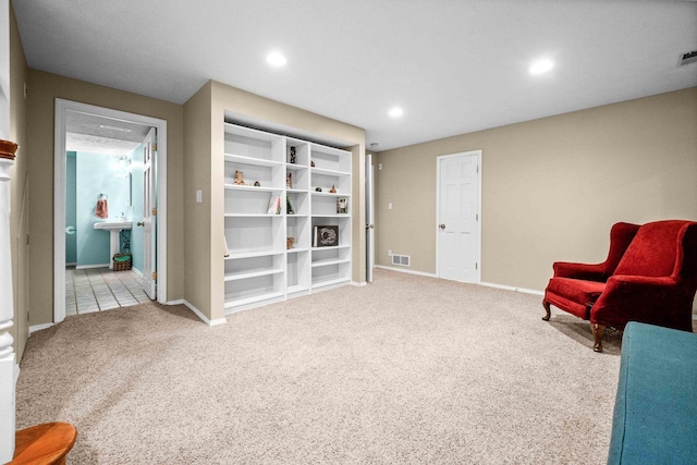 sitting room with visible vents, recessed lighting, carpet, and baseboards