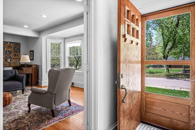 entryway with recessed lighting and wood finished floors