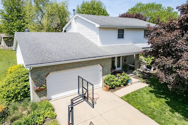 1107 N Bailey Dr, Pontiac, IL 61764 - traditional-style house featuring brick siding, a shingled roof, an attached garage, and a front lawn