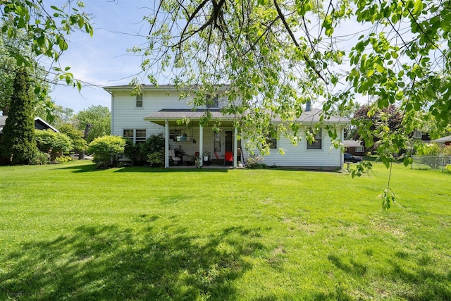 1107 N Bailey Dr, Pontiac, IL 61764 - back of house with a lawn