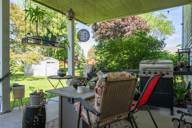 1107 N Bailey Dr, Pontiac, IL 61764 - view of patio with a storage unit, an outbuilding, a grill, and outdoor dining area