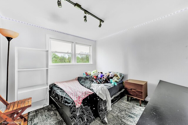bedroom with concrete flooring