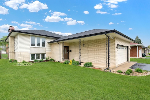 4424 Maple Ave, Brookfield, IL 60513 - tri-level home featuring a front lawn, brick siding, a garage, a chimney, and driveway