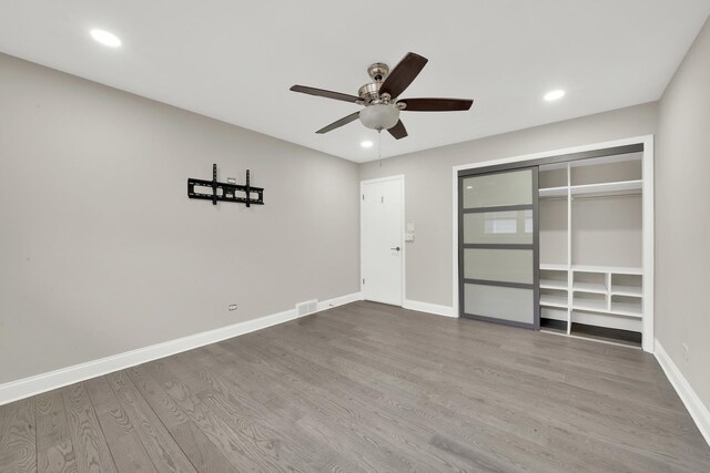 4424 Maple Ave, Brookfield, IL 60513 - unfurnished bedroom featuring baseboards, recessed lighting, wood finished floors, and visible vents