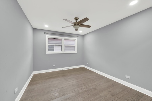 4424 Maple Ave, Brookfield, IL 60513 - unfurnished room with a ceiling fan, baseboards, visible vents, and wood finished floors