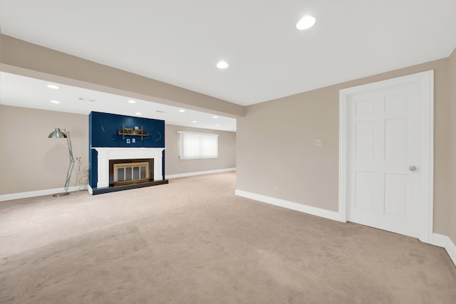 4424 Maple Ave, Brookfield, IL 60513 - unfurnished living room featuring recessed lighting, baseboards, a glass covered fireplace, and light carpet