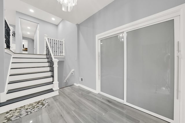 4424 Maple Ave, Brookfield, IL 60513 - foyer with recessed lighting, baseboards, stairs, and wood finished floors