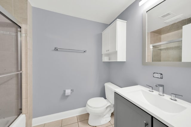 4424 Maple Ave, Brookfield, IL 60513 - full bath with visible vents, vanity, toilet, tile patterned floors, and combined bath / shower with glass door