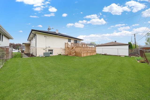 4424 Maple Ave, Brookfield, IL 60513 - back of property with a fenced backyard, a lawn, a deck, and cooling unit