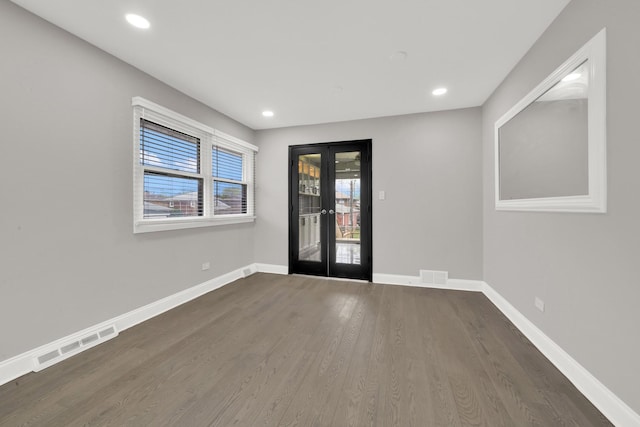 4424 Maple Ave, Brookfield, IL 60513 - spare room with baseboards, french doors, wood finished floors, and visible vents