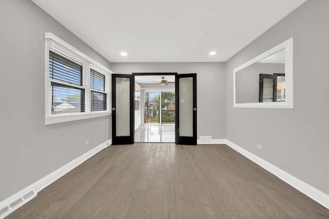 4424 Maple Ave, Brookfield, IL 60513 - unfurnished room featuring visible vents, baseboards, and wood finished floors