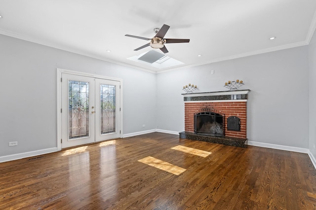 unfurnished living room featuring a fireplace, a ceiling fan, baseboards, visible vents, and ornamental molding